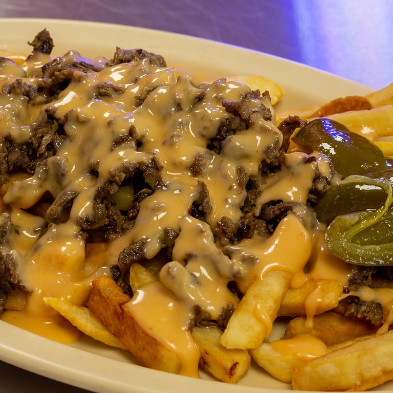 Indulge in our cheese fries